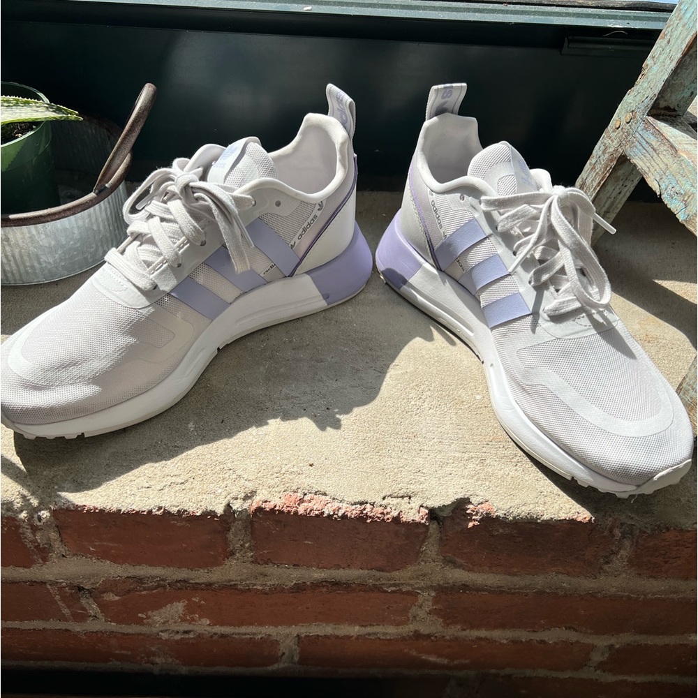 Purple and gray adidas women’s tennis shoes